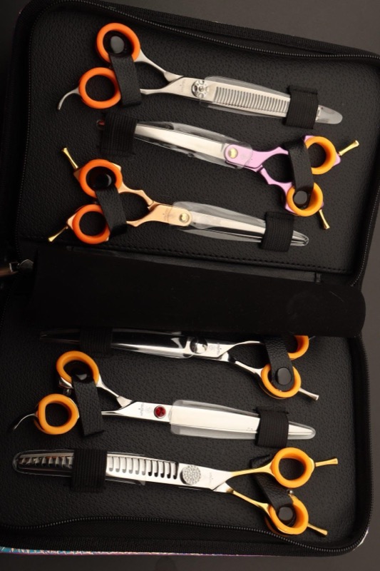 The GroomRoom scissor set - five scissors, a bonus pair and a display case